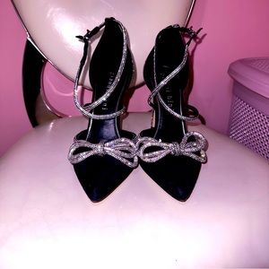 Ezlynn Rhinestone Embellished Bow Suede Pointed Toe Pumps by Gianni Bini